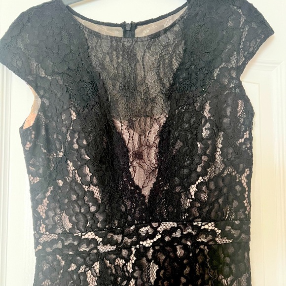 Xcape lace overlay black evening gown. Fitted bodice and flair bottom - Picture 2 of 3
